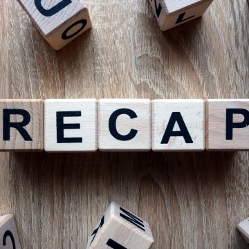 Wooden blocks that spell out Recap 